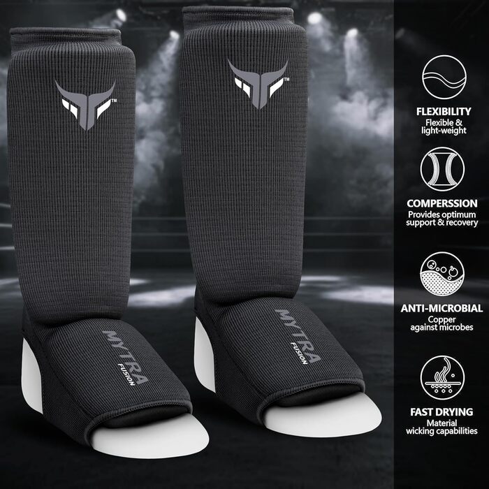 Захисники ніг для кікбоксингу Junior - легкі, дихаючі, з підкладкою, чорні. Підходять для кікбоксингу, муай-тай, MMA. Розмір XXS.