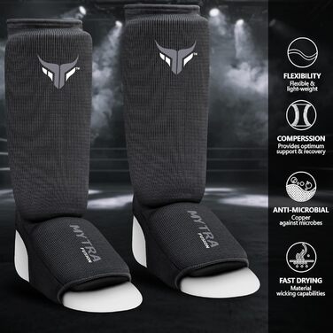 Захисники ніг для кікбоксингу Junior - легкі, дихаючі, з підкладкою, чорні. Підходять для кікбоксингу, муай-тай, MMA. Розмір XXS.