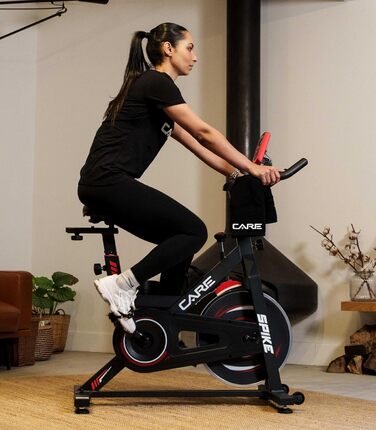 CARE FITNESS Велотренажер для дому - Spike 74450 з маховиком 12 кг, педалі з зачепом, триатлонний кермо та ролики для пересування