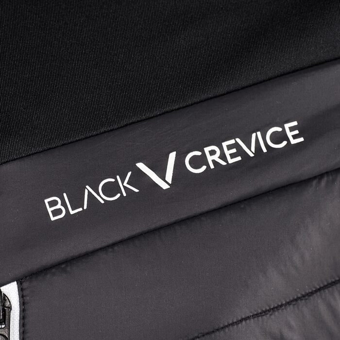 Чоловіча лижна куртка Black Crevice для гірськолижного туризму. Тепла зимова куртка з нейлону, PES та спандексу. Вітро- та водонепроникна, з великою свободою рухів. Чорно-біла.