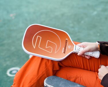 GAMMA Rainmaker: ракетка для піклболу – легка, велика зона удару, карбонове покриття з мікроперлинками для обертання та контролю, амортизуюча ручка, регульована вага, 6 кольорів (Помаранчевий/Західний з візерунком 'Sunset Chevron')