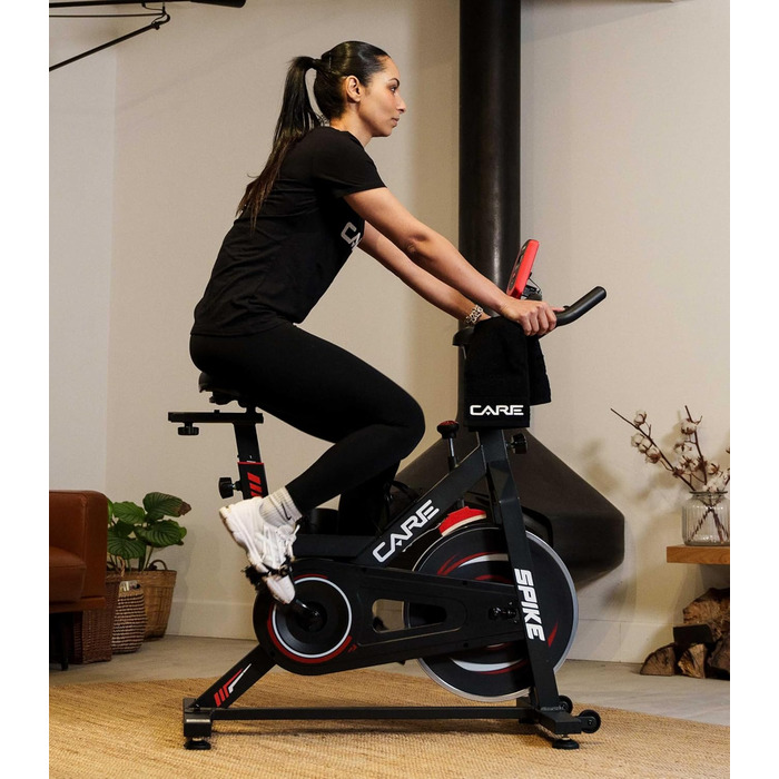 CARE FITNESS Велотренажер для дому - Spike 74450 з маховиком 12 кг, педалі з зачепом, триатлонний кермо та ролики для пересування