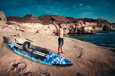 Надувний SUP-борд для веслування стоячи з каяковим сидінням, 330x76x15 см, вантажопідйомність до 150 кг, кріплення Cam, інтегрована підставка для ніг, 3 плавники, регульоване дволопатеве весло, повний комплект аксесуарів, блакитний камуфляж